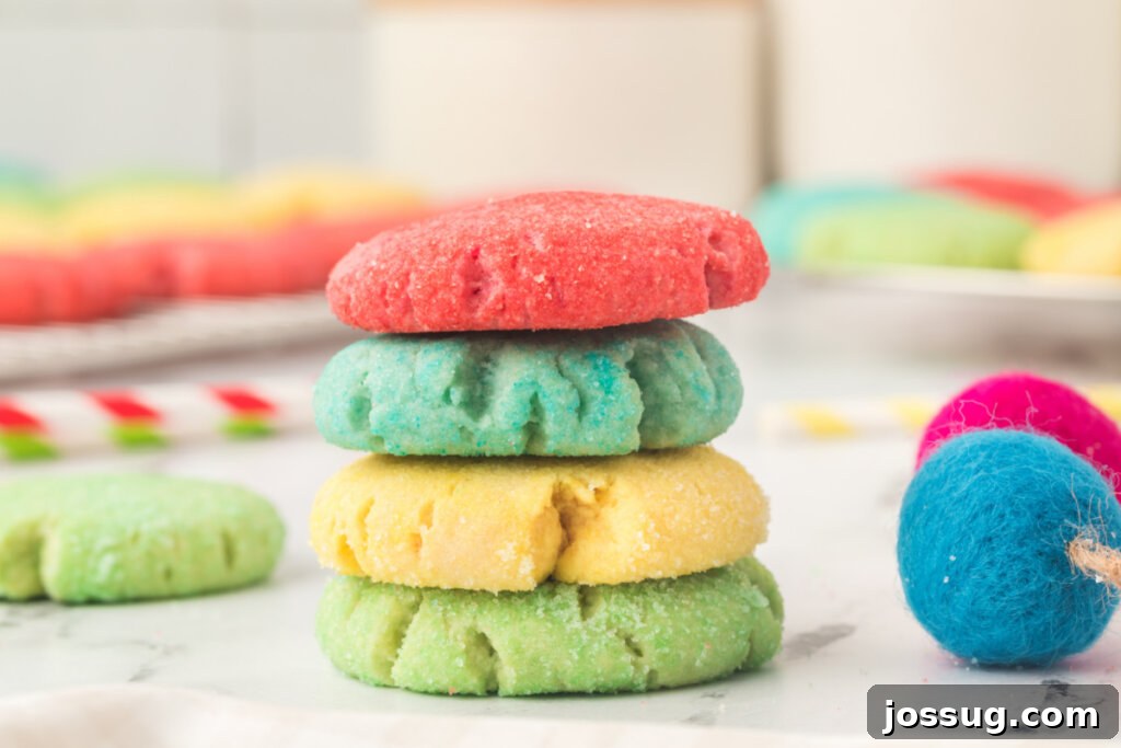 A stack of red, blue, yellow, and green Jello cookies, highlighting their festive appeal