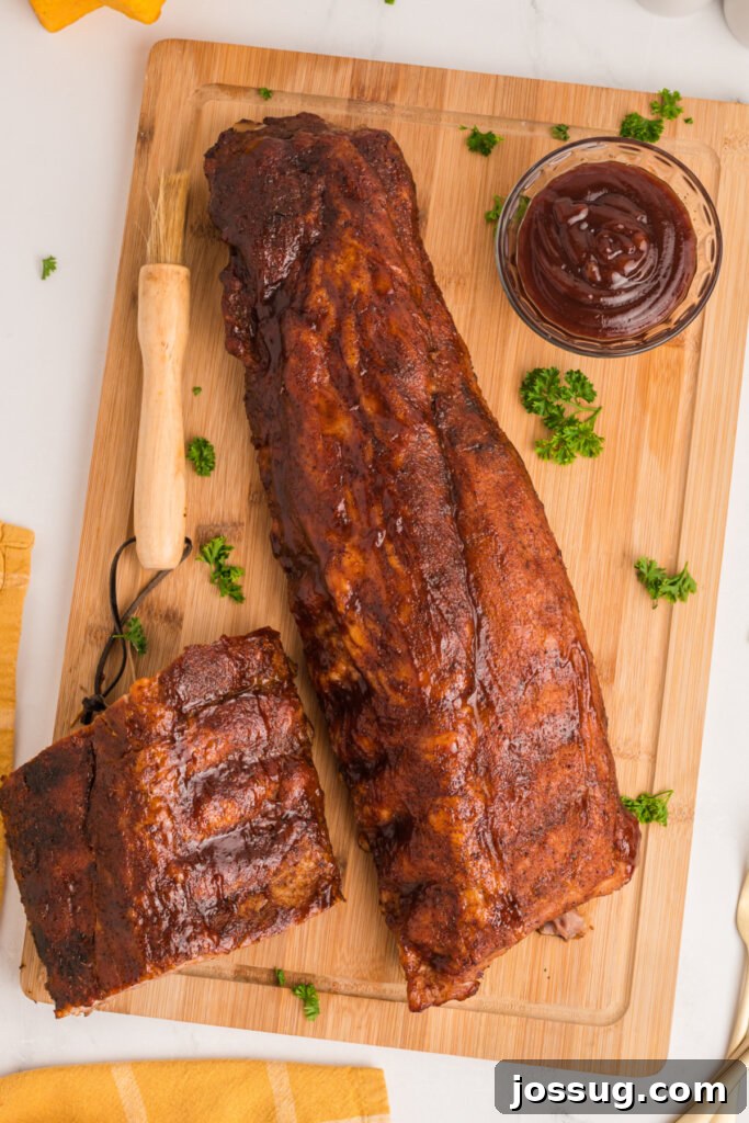 Mouthwatering Oven Ribs 4 full slab of oven baked ribs on cutting board