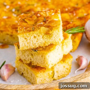 three slices of rosemary focaccia stacked