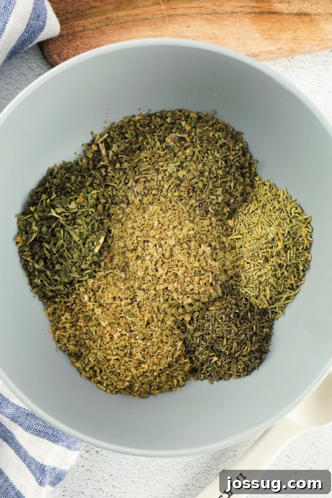 spices and herbs in bowl to make italian seasoning