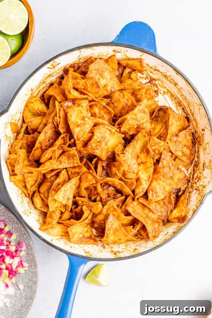 Decadent Mole Chilaquiles 7 Simmer for 5-7 minutes or until the chips have absorbed most of the salsa.