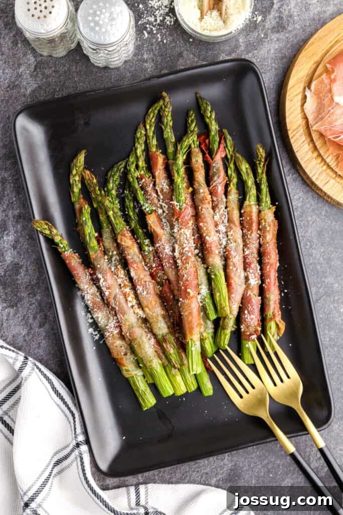air fryer prosciutto wrapped asparagus on plate