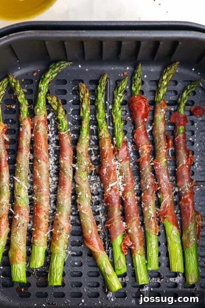 Remove from air fryer. Sprinkle with grated parmesan cheese. Serve. 