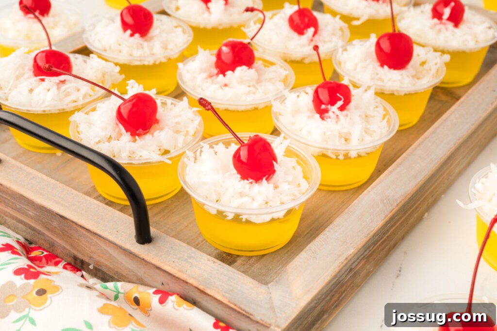 Paradise Piña Jiggle Shots 6 gelatin shots on a wooden tray