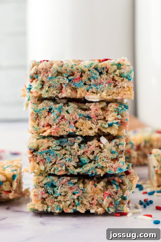 Patriotic Crispy Rice Squares 3 Four patriotic rice crispy treats stacked