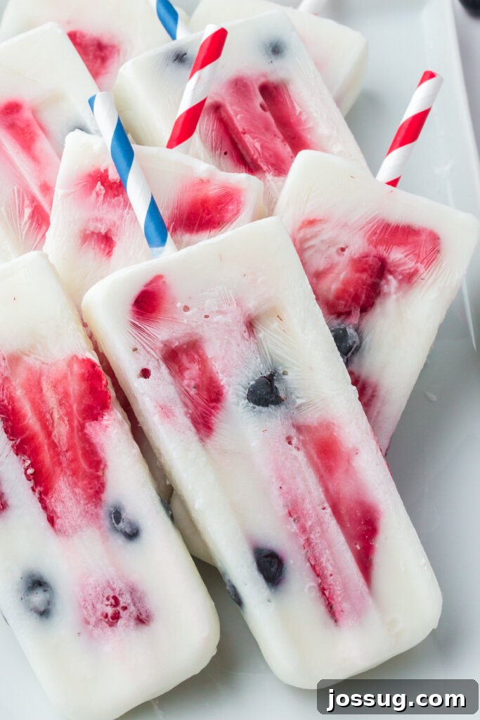 Red White and Blue Berry Pops 2 patriotic berry popsicles piled on plate
