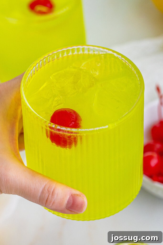 hand holding Midori Sour