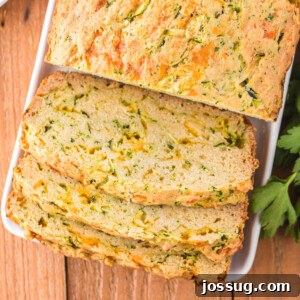 cheesy zucchini bread with a few slices cut