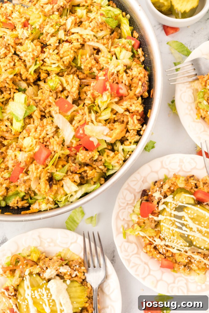 skillet and plates with cheeseburger fried rice
