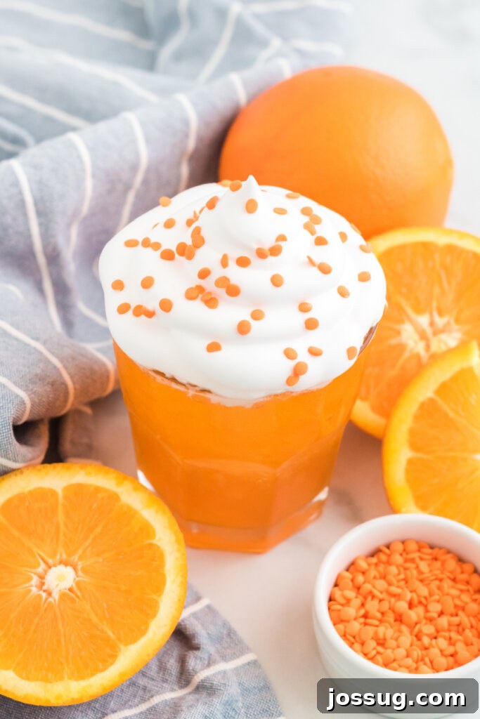 creamsicle cocktail with fresh oranges