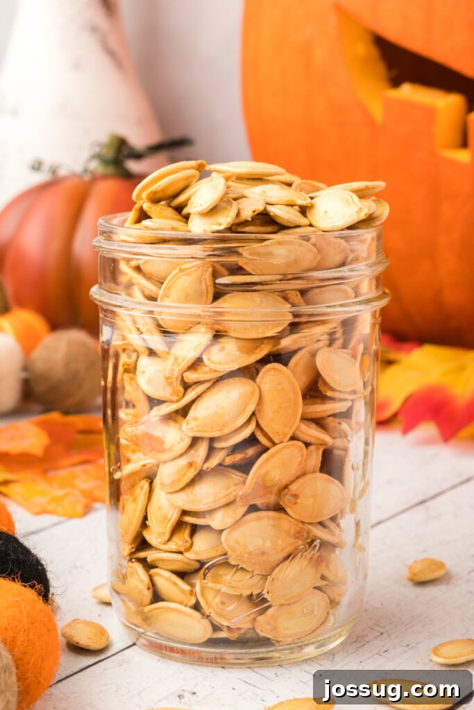 Crunchy Golden Pumpkin Seeds 2 glass jar holding roasted pumpkin seeds
