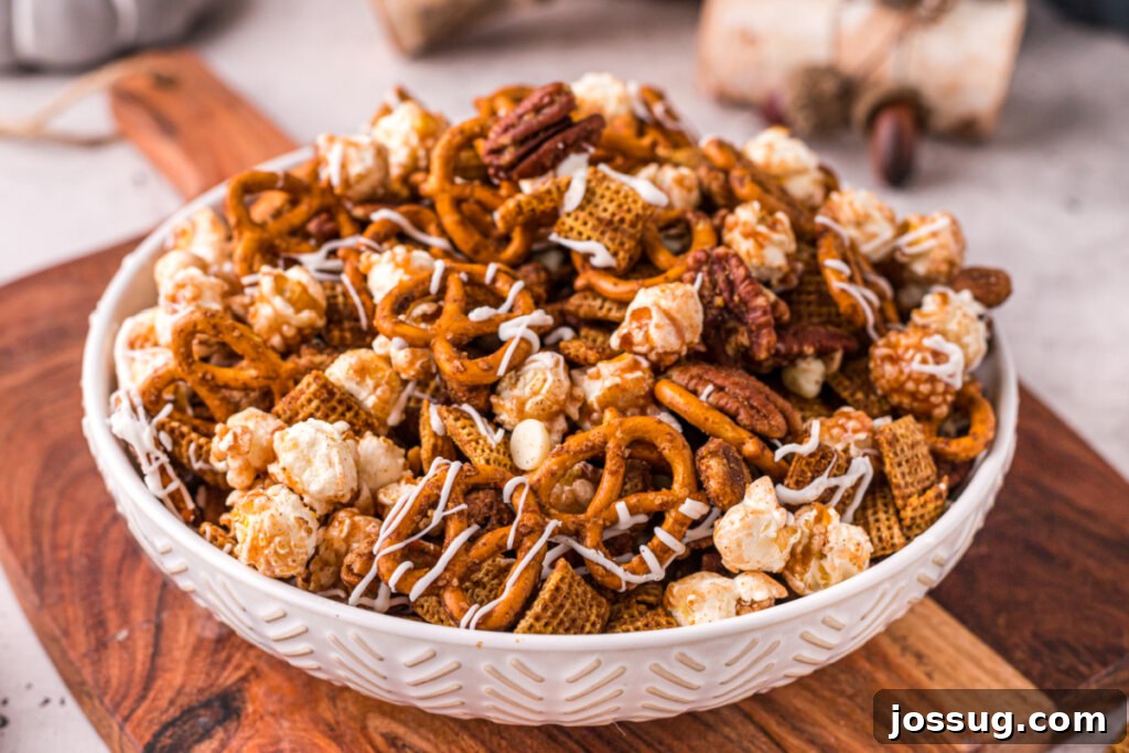 Crispy Autumn Air Fryer Snack Mix 6 An overhead shot of a large bowl filled with Air Fryer Fall Chex Mix, showcasing the generous quantity and inviting presentation.