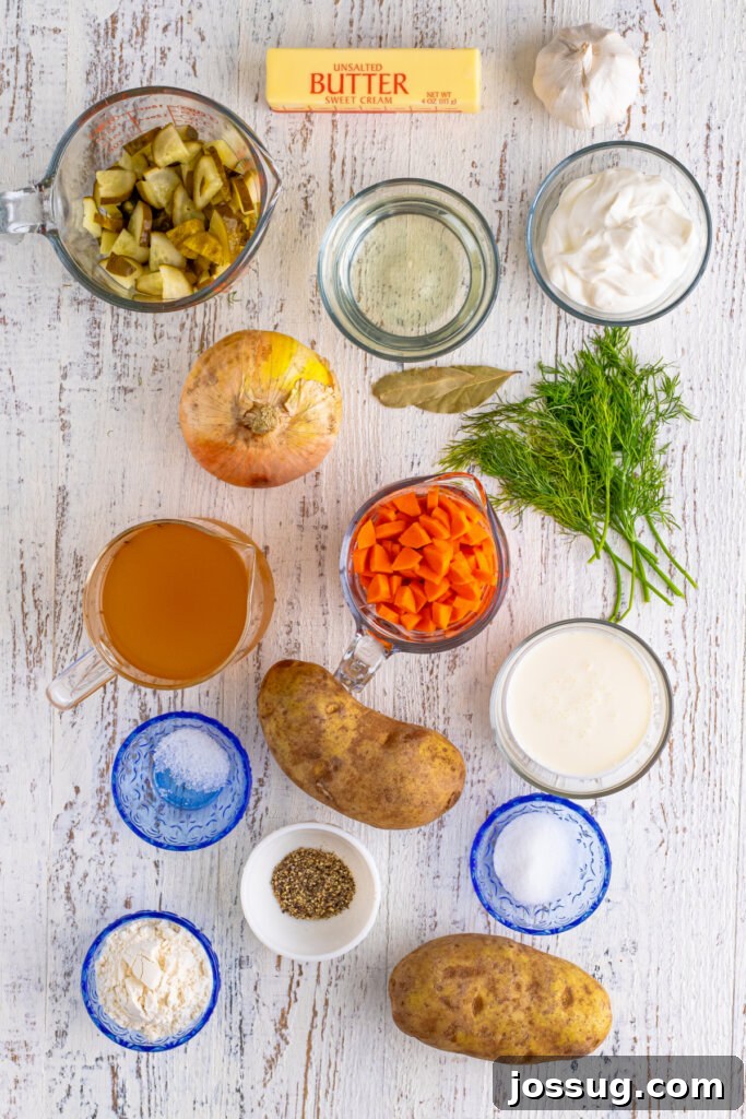 Creamy Dill Pickle Delight 3 A vibrant selection of fresh ingredients including dill pickles, potatoes, carrots, onions, and fresh dill, ready for making Dill Pickle Soup.