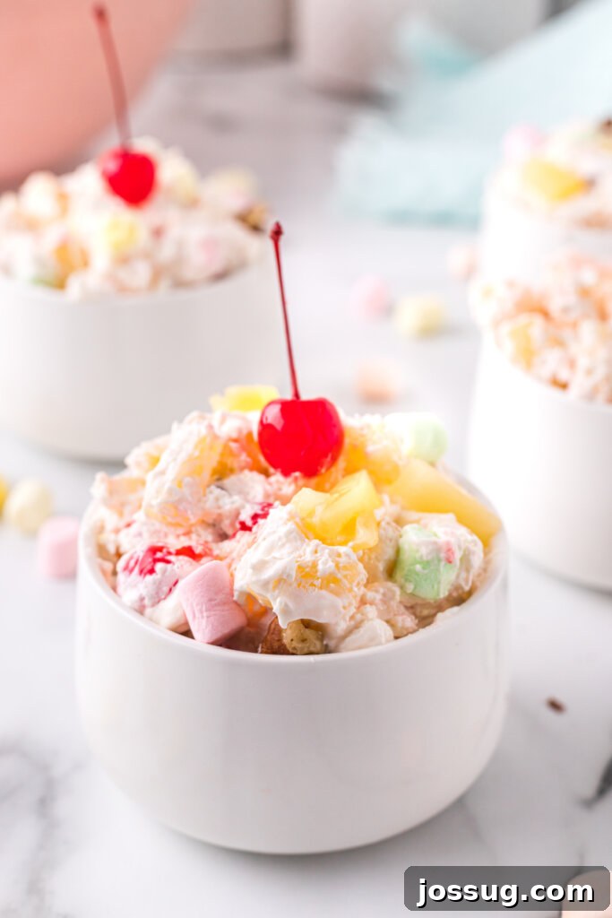 white bowl filled with pineapple fluff salad