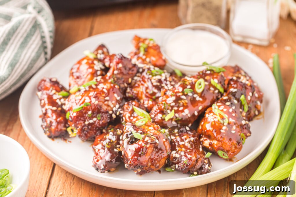 Crispy Sticky Teriyaki Air Fryer Wings 6 air fryer teriyaki chicken wings on plate