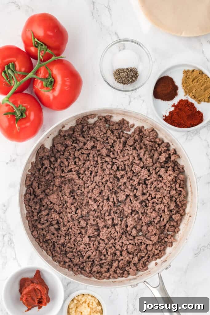 Crispy Air-Fried Beef Empanadas 5 In a skillet over medium-high heat, cook ground beef until browned and cooked through about 8-10 minutes. Drain any excess fat.