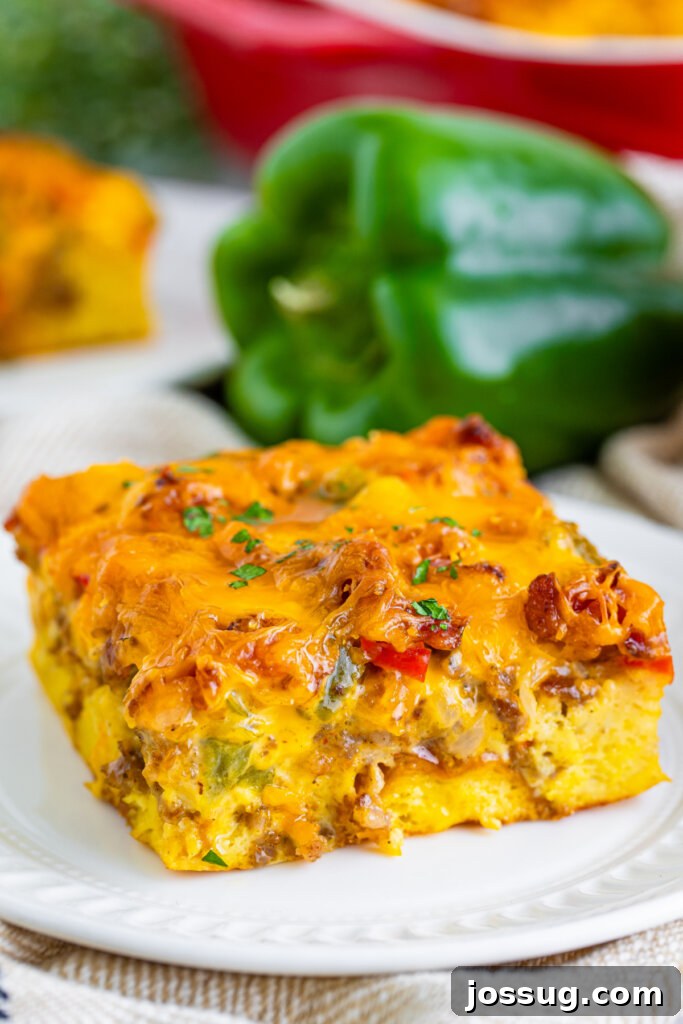 Make-Ahead Christmas Morning Strata 2 slice of overnight christmas breakfast casserole on plate