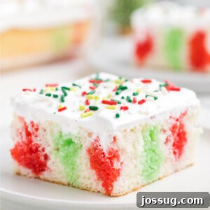 slice of christmas poke cake on plate
