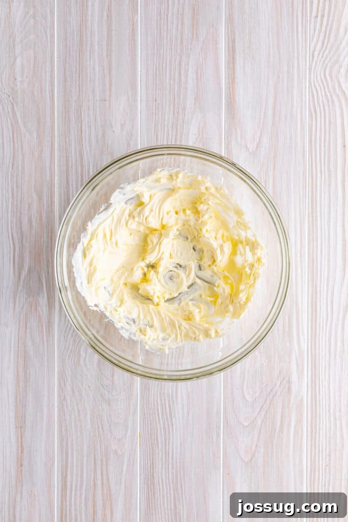 Crispy Crab Clouds 4 In a large bowl, whip the cream cheese until smooth with an electric hand mixer.