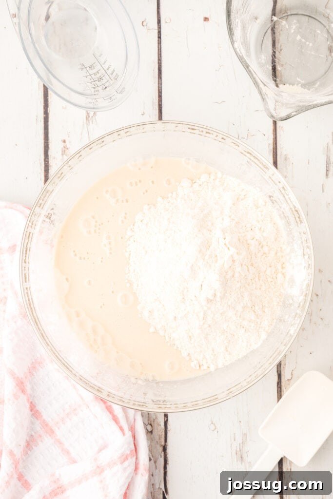 Stir in the remaining flour (the batter will be stiff).