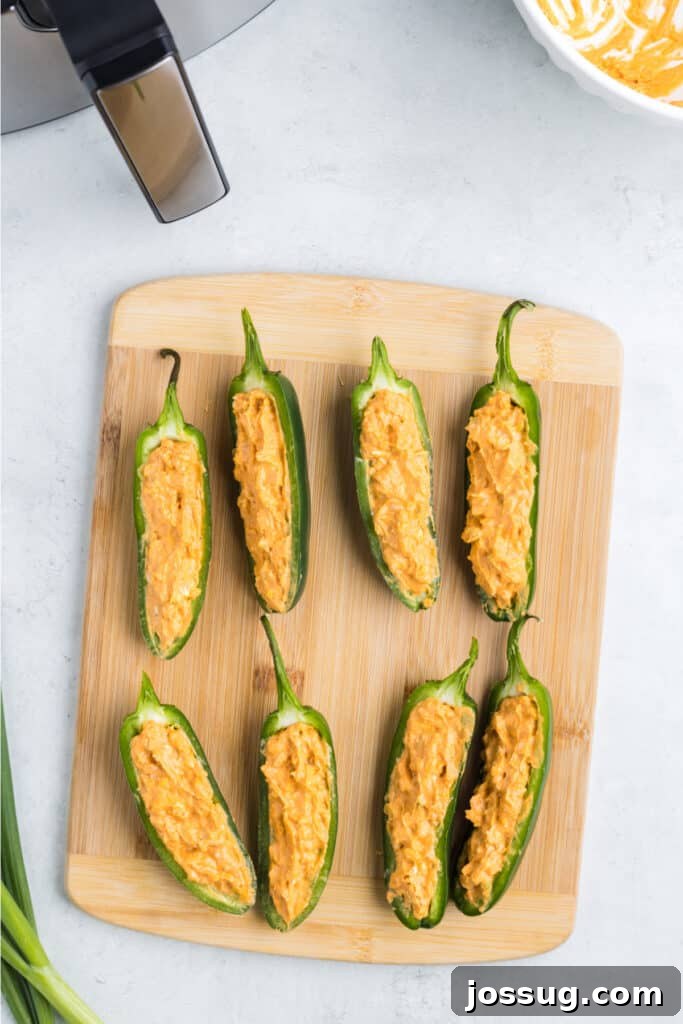 Fill each jalapeno half with the cream cheese mixture.