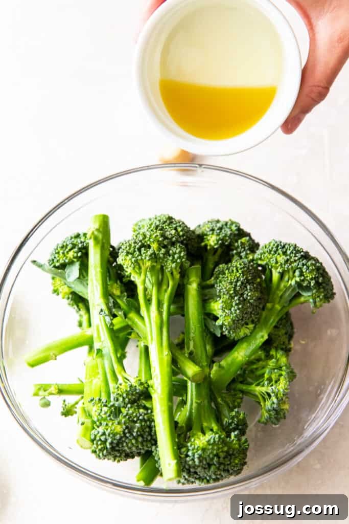 Crispy Air-Fried Broccolini 4 In a large bowl add the broccolini, oil, lemon juice, minced garlic, salt and black pepper.