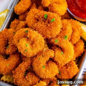 closeup of panko fried shrimp on plate