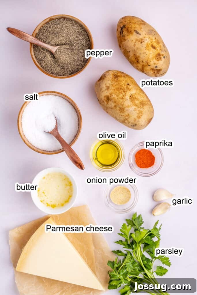 A vibrant display of fresh ingredients ready to make garlic parmesan fries, including russet potatoes, garlic cloves, olive oil, parmesan cheese, and parsley.