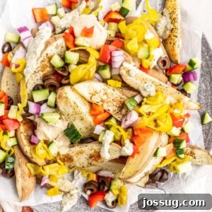 closeup of loaded mediterranean potato wedges