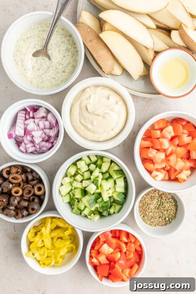 Mediterranean Potato Wedge Feast 3 Overhead view of small bowls filled with colorful Mediterranean toppings and sauces, artfully arranged around a plate of raw, seasoned potato wedges, ready for baking.