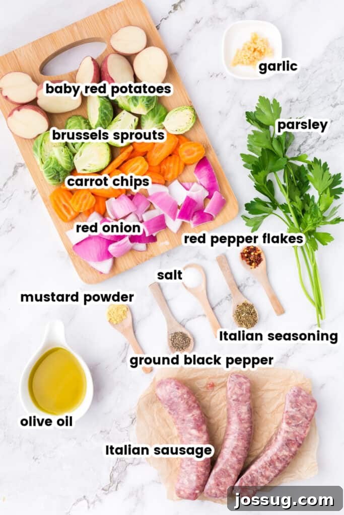 Roasted Sausage and Veggie Medley 3 ingredients to make sheet pan sausage and veggies laid out on a table