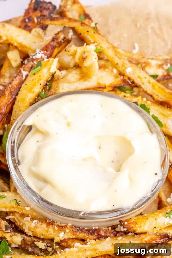 closeup of a bowl filled with garlic aioli
