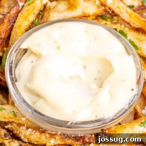 closeup of homemade garlic aioli in small bowl