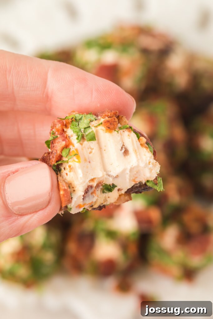 Keto Bacon & Sundried Tomato Cheese Poppers 5 hand holding keto snacks