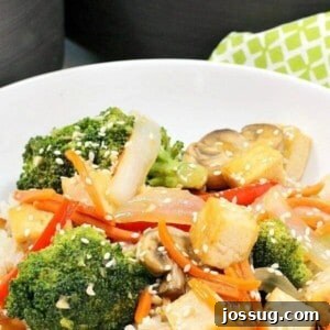 Garlic & Ginger Green Tea Stir Fry in a white bowl.