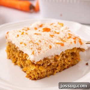slice of carrot cake on plate