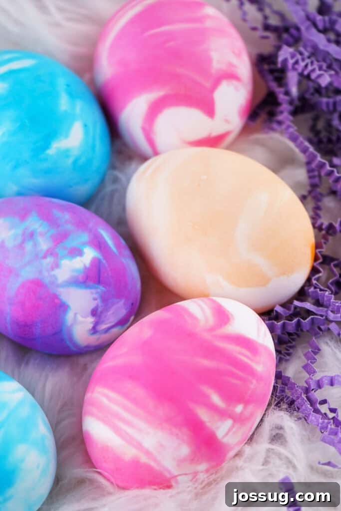 Cool Whip Marbled Easter Eggs 2 Several assorted color cool whip dyed Easter eggs displayed beautifully