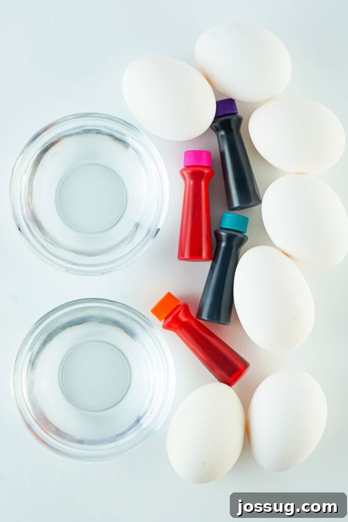 Ingredients laid out on a table for making food coloring dyed Easter eggs