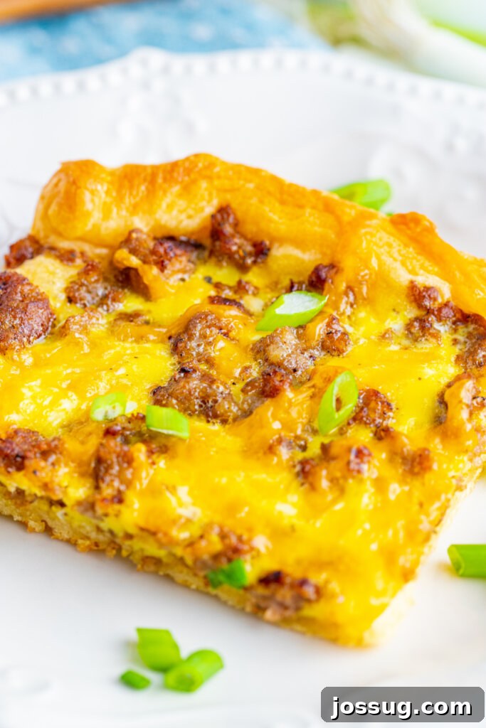 Another view of the family-friendly brunch pizza, showcasing its golden crust and savory toppings
