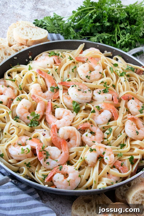 Shrimp scampi with pasta in pan - Valentine's Day food ideas