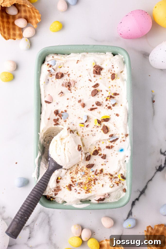 no churn cadbury mini egg ice cream in container with scoop