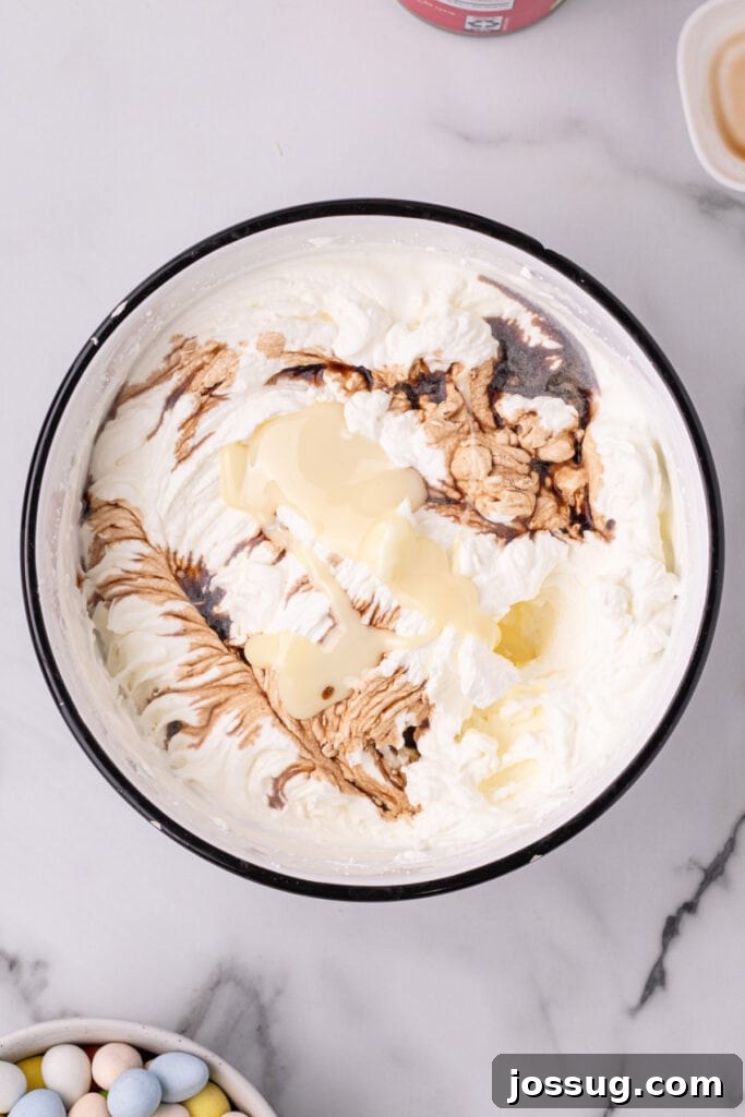 vanilla and sweetened condensed milk added to the whipped cream