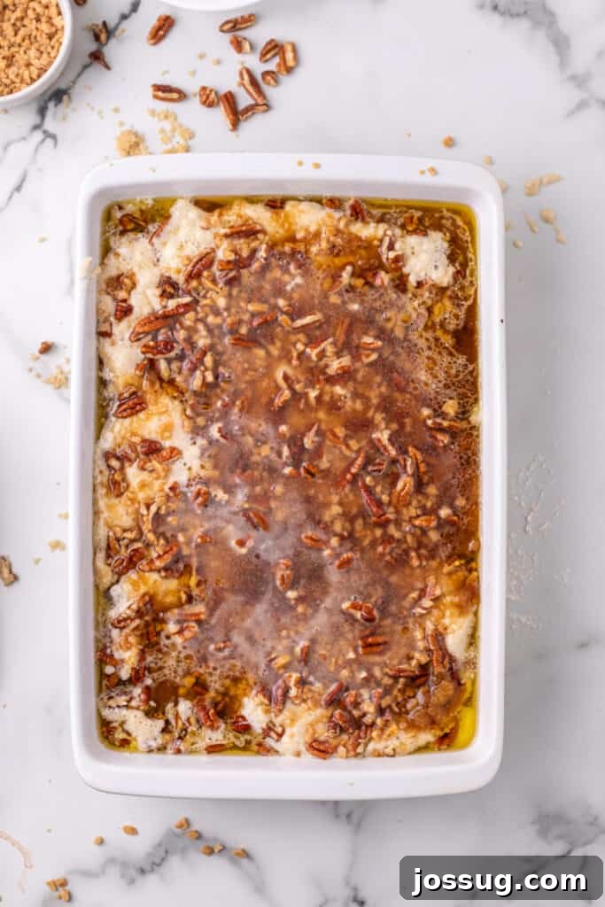 Decadent Pecan Cobbler 7 Boiling water poured over the top of the Pecan Pie Cobbler before being baked
