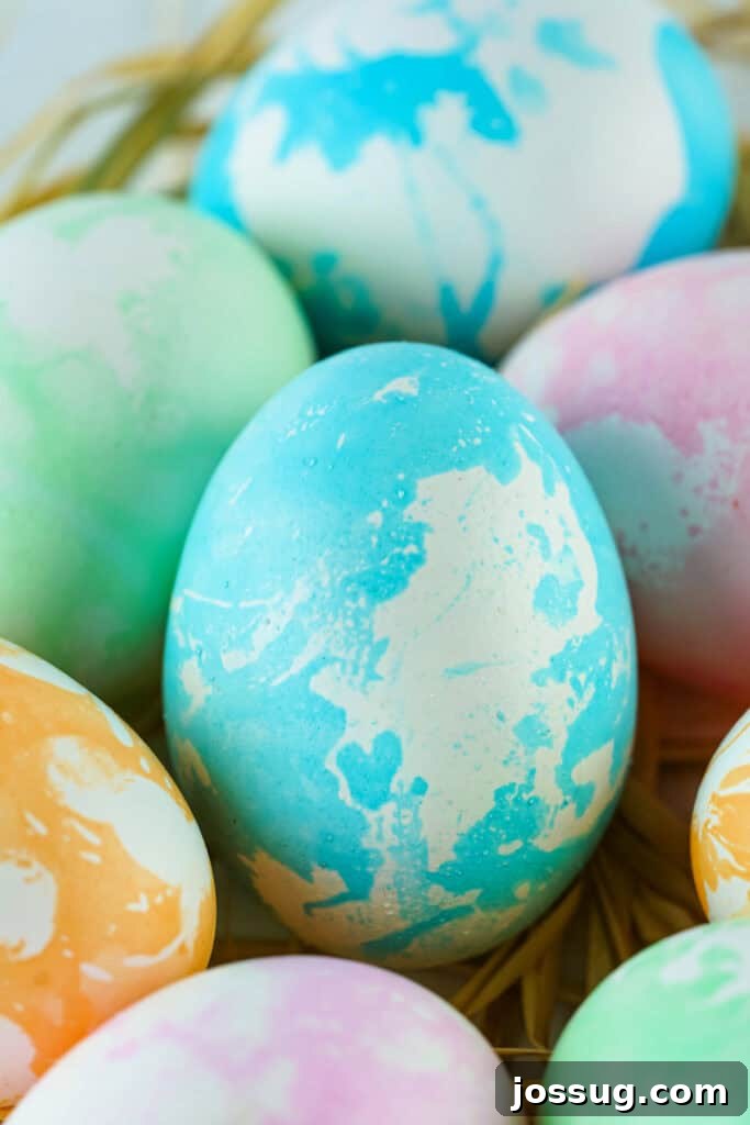 Assorted colors of stunning marbled Easter eggs with intricate swirl designs