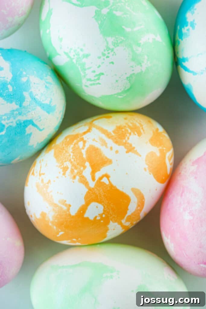 Looking down on a collection of beautifully marbled Easter eggs from above