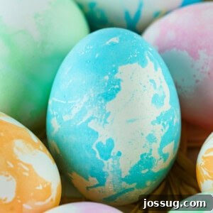 Closeup of a vibrant marbled Easter egg with unique patterns