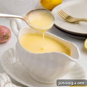 Closeup of perfectly prepared lemon butter sauce in a serving dish, showcasing its rich and inviting appearance.