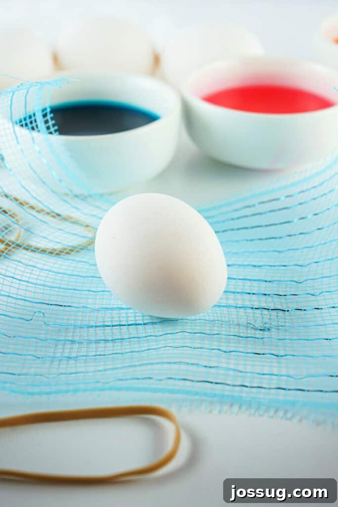 Textile Art Easter Eggs 3 What you'll need to make fabric textured Easter eggs: fabric scraps, hard-boiled eggs, dye, rubber bands, paper towels, and scissors.