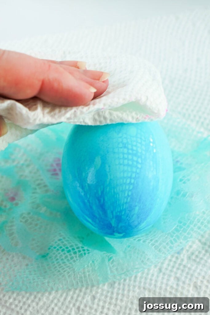 Textile Art Easter Eggs 7 Gently patting the fabric textured Easter egg dry with a paper towel after unwrapping.