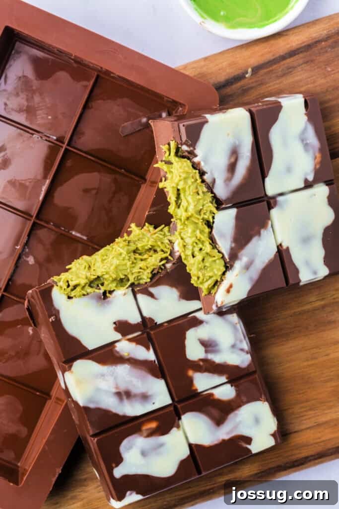 Golden Dubai Delight 15 Top-down view of a sliced Dubai Chocolate Bar on a wooden board, highlighting the creamy green pistachio filling.